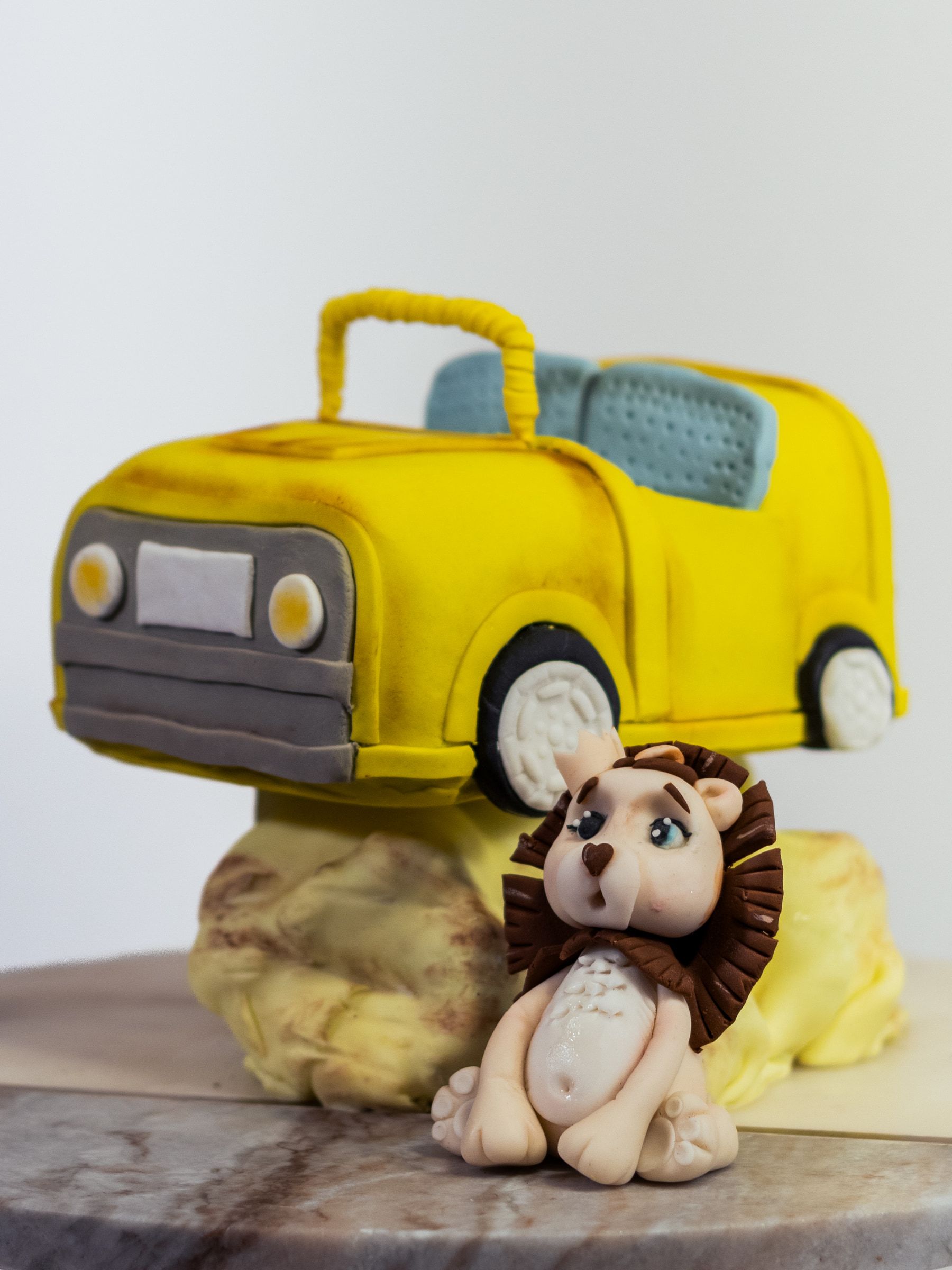 Yellow car and lion