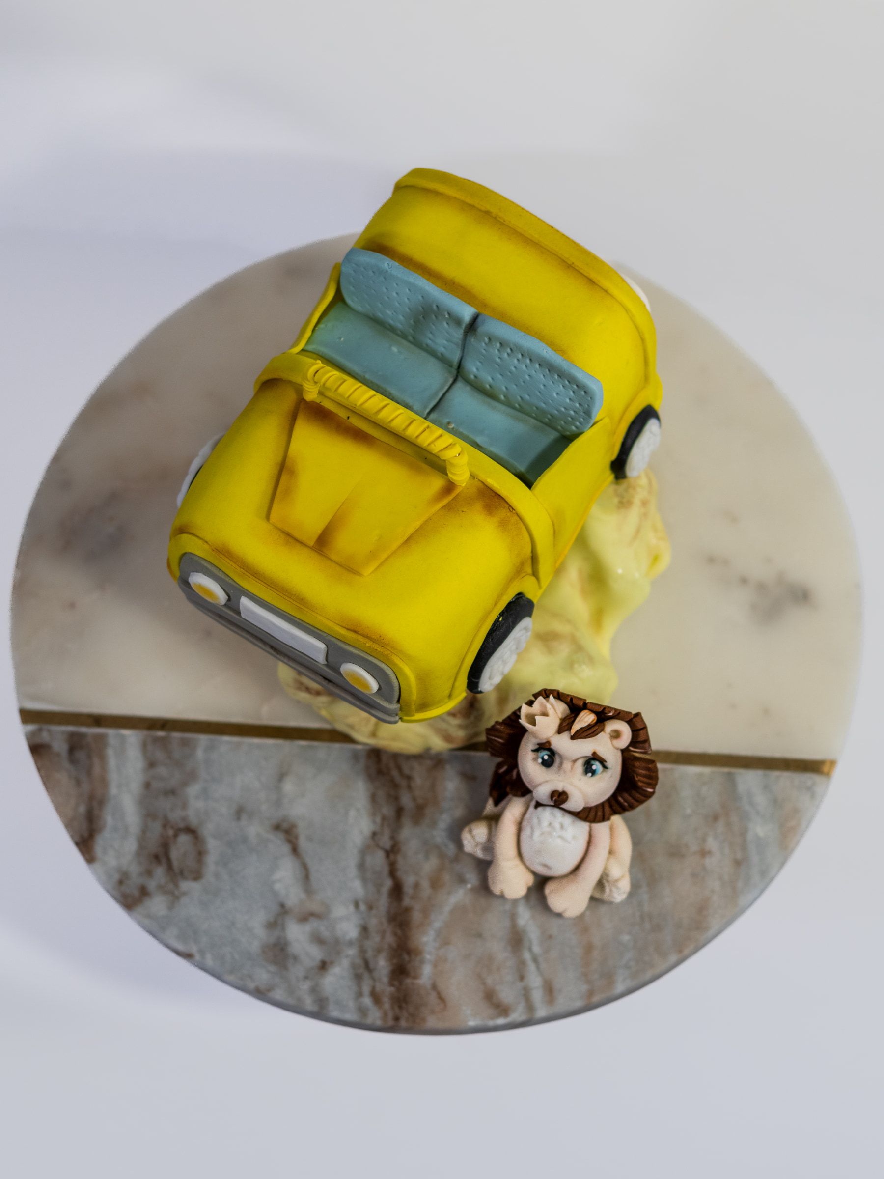 Yellow car and lion