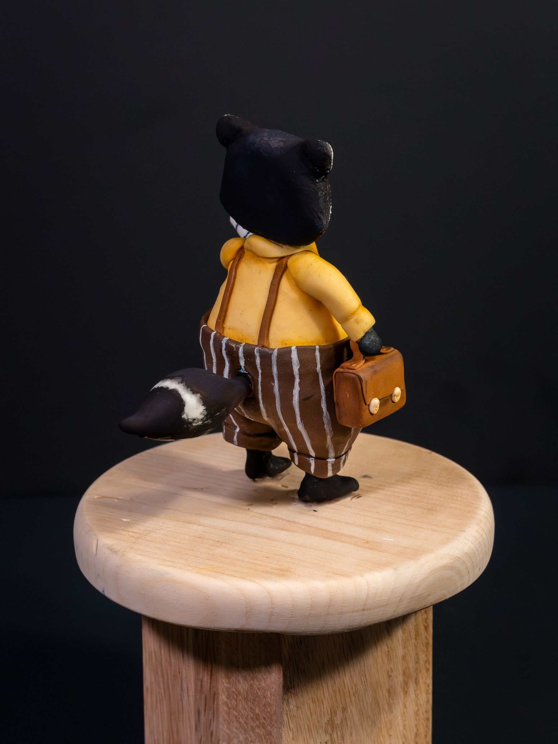 Raccoon with newspaper